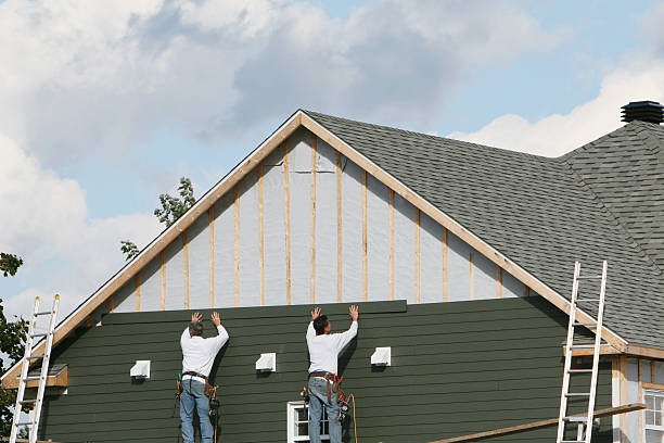 Professional Storm Damage Siding Repair technician working in Leetsdale, PA